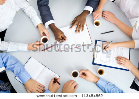 stock-photo-image-of-business-people-hands-working-at-meeting-113484862